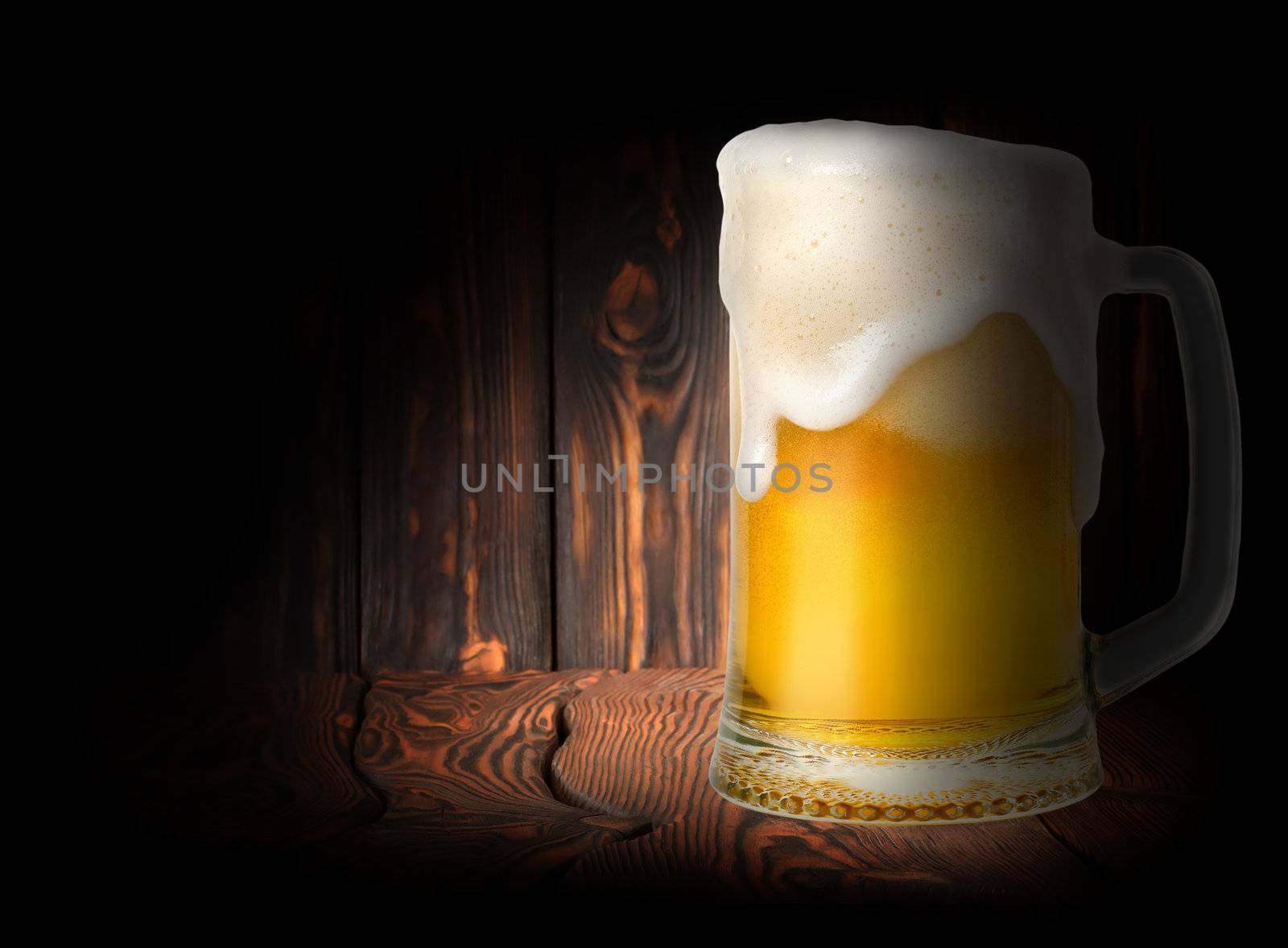Lager Beer on a dark wooden background