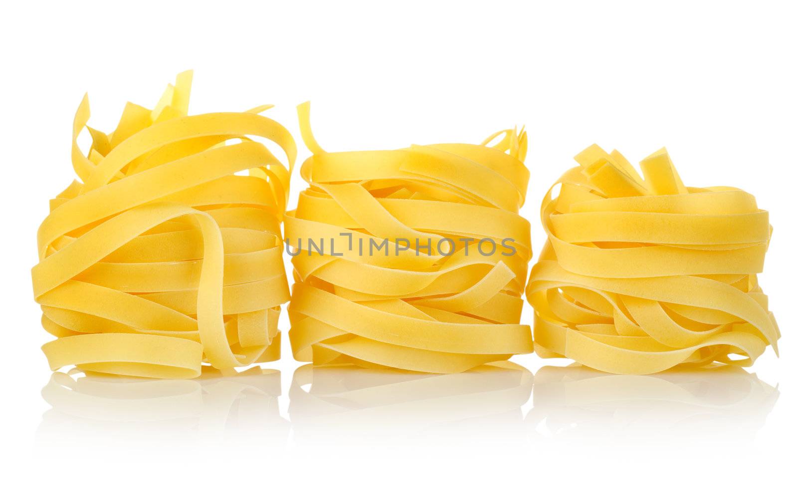 Three pastas tagliatelle isolated on a white background
