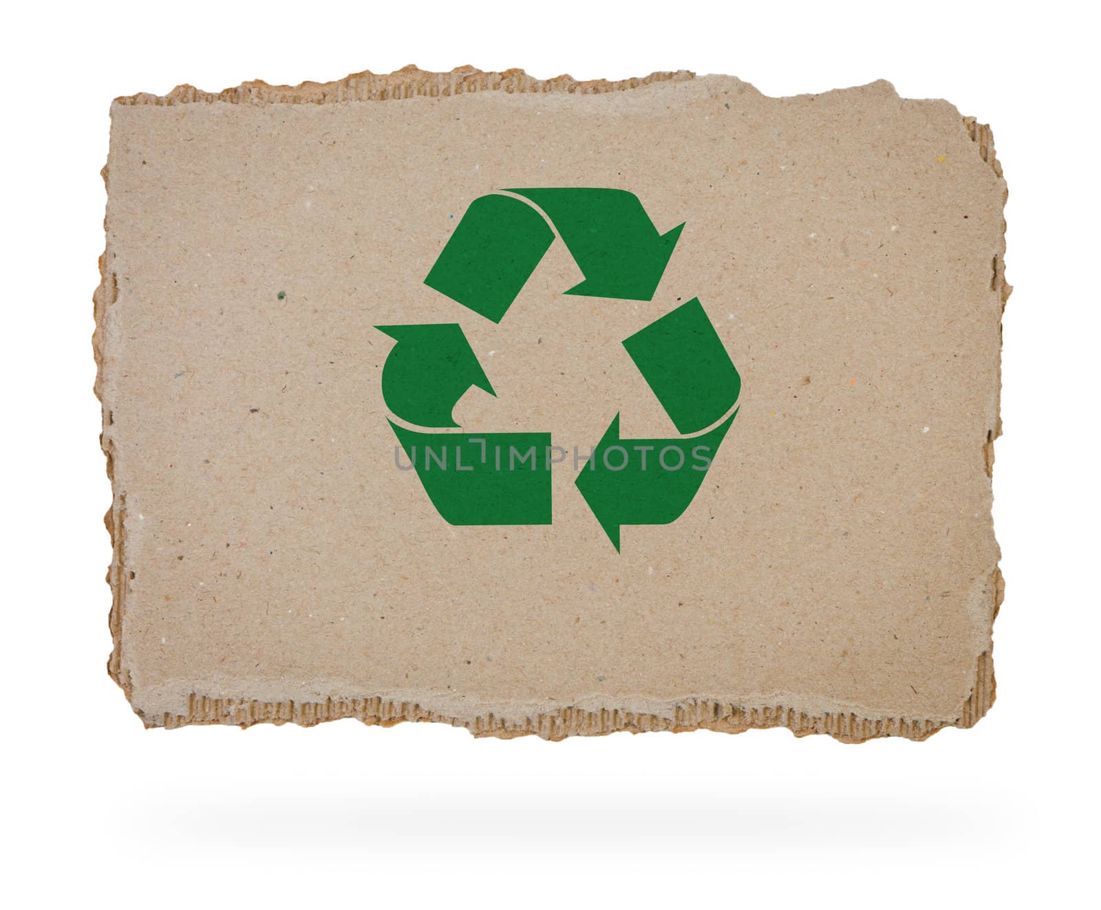 Green resecycle sign on piece of cardboard.