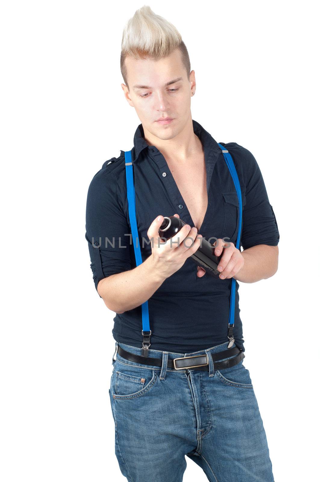 Handsome man in jeans with bottle on his hands