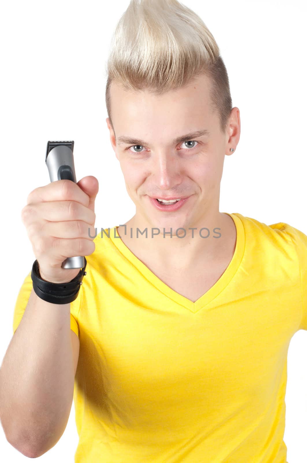 Handsome man in yellow t-shit and with razor