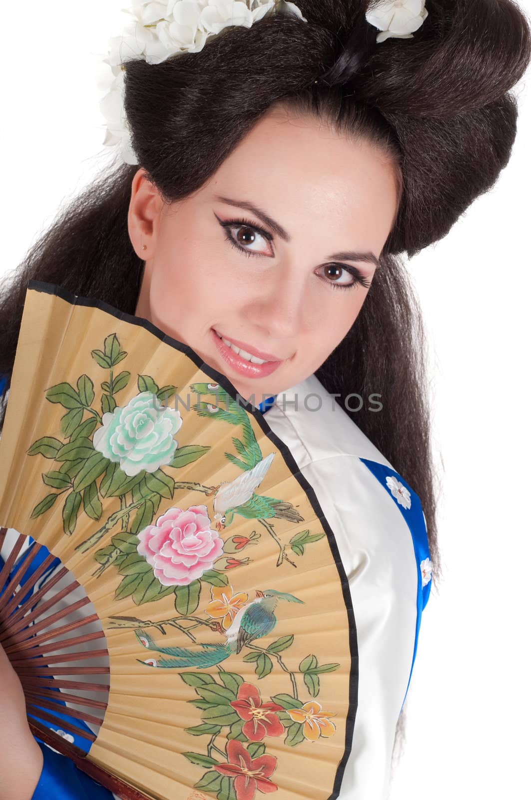 Geisha style young woman with fan