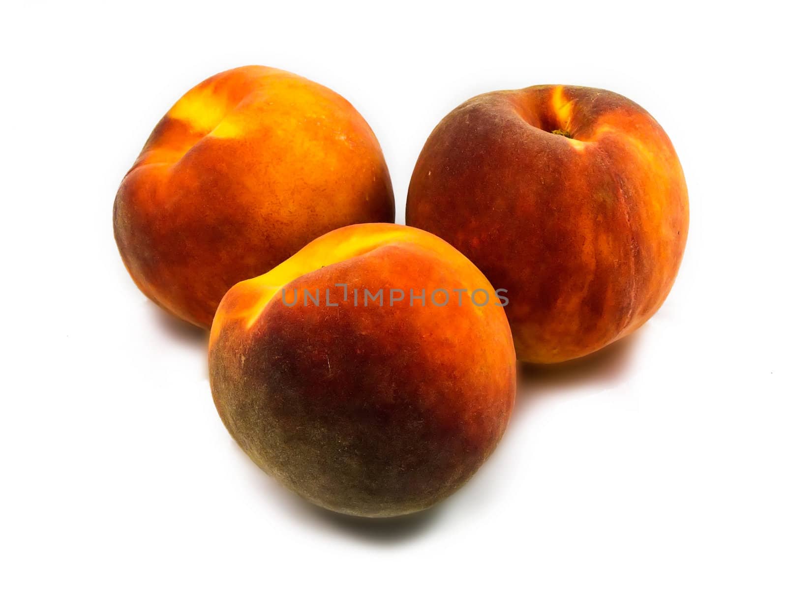 Fresh ripe peaches isolated on white background