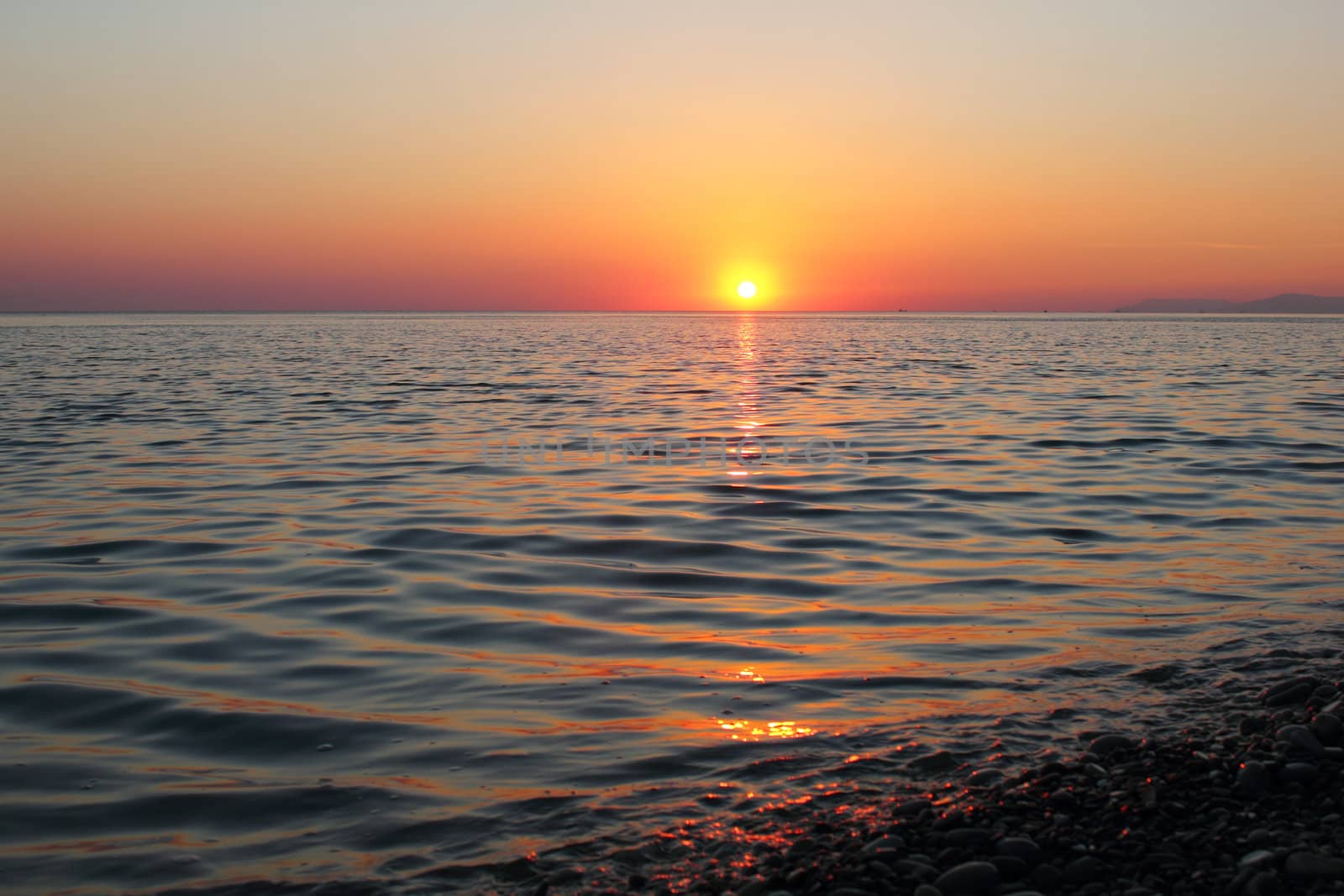 Sunset on the sea coast.