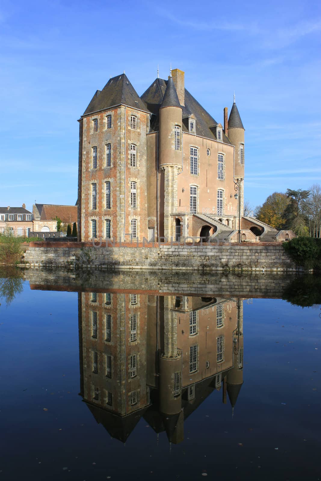 a castle with its moats, its park and garden with its towers and its ancient architecture