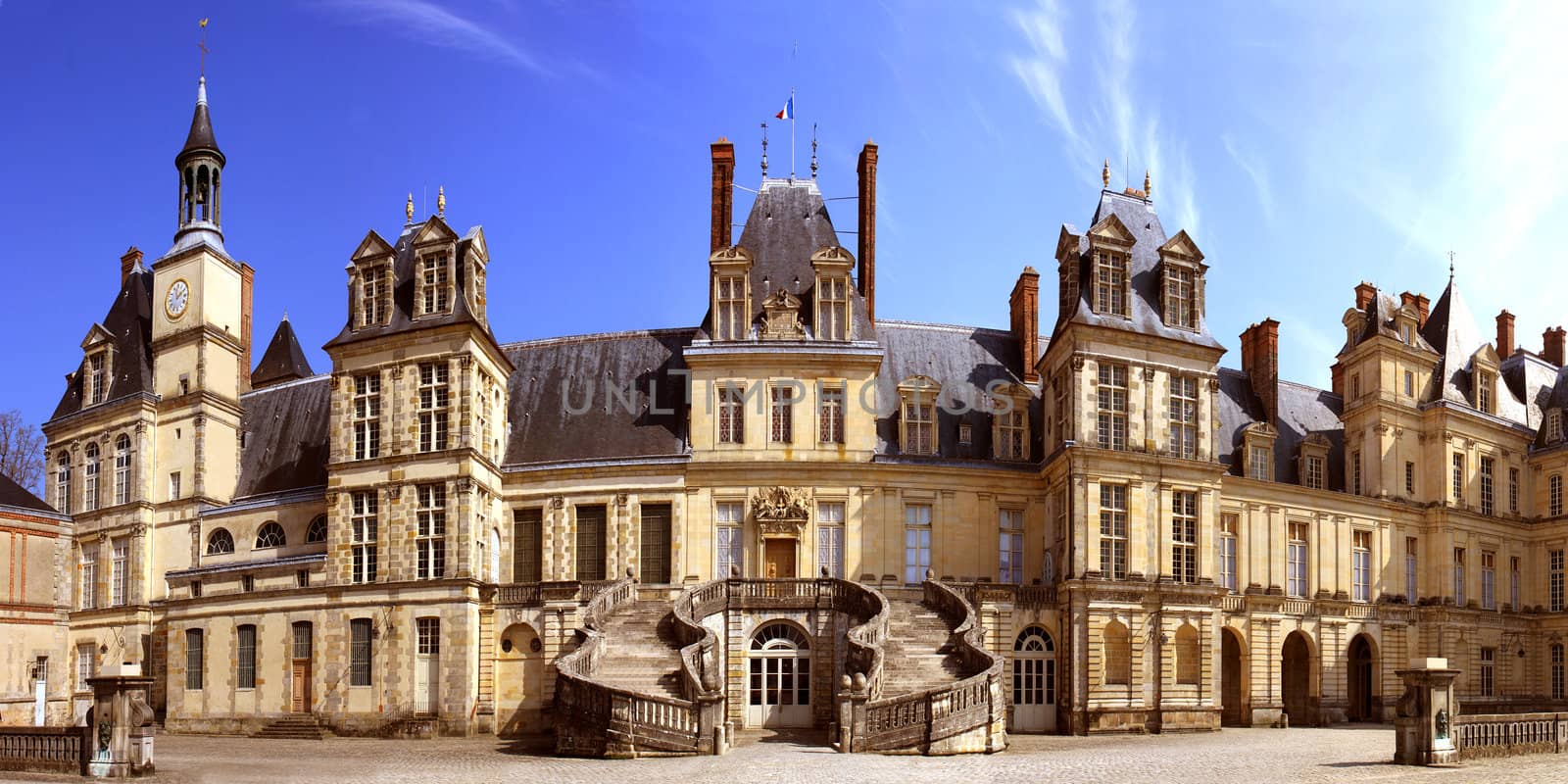 Panoramic view of the castle of Fontainebleau and its staircase