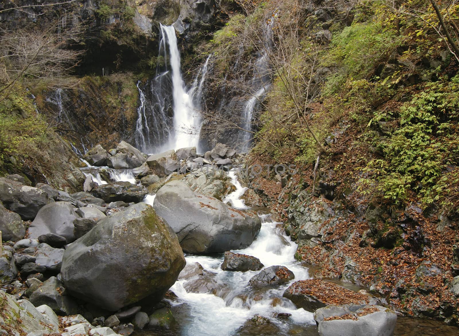 scenic waterfall Urami in Nikko, Japan at late autumn season