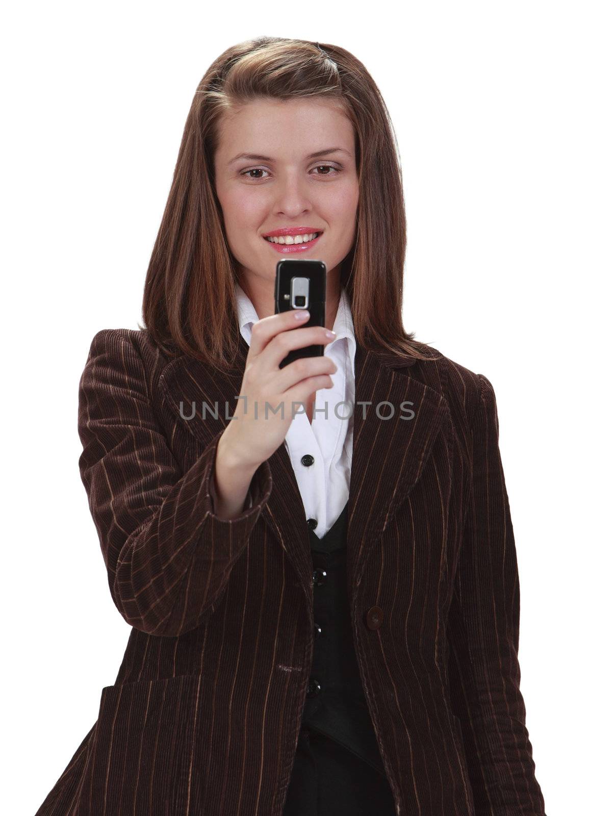 Image of a young woman taking photos with a mobile phone camera. The main focus is on her face.
