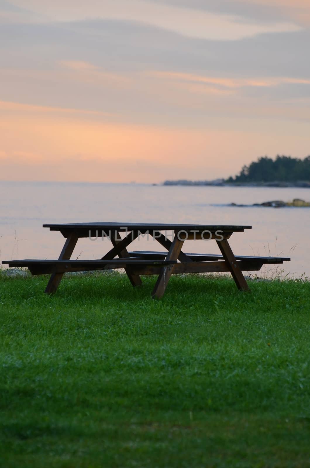 A bench at a rest area by the sea