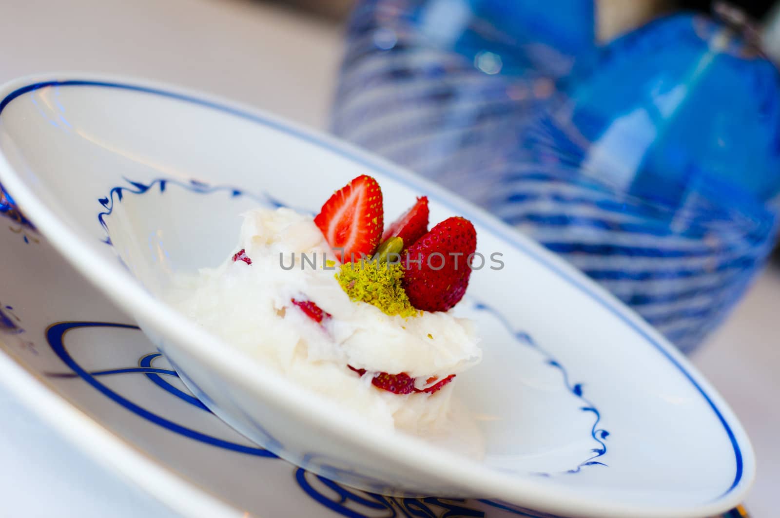 Gullac or Güllaç, a traditional Turkish-Ottoman milky dessert made with thin dough layers and rose extract