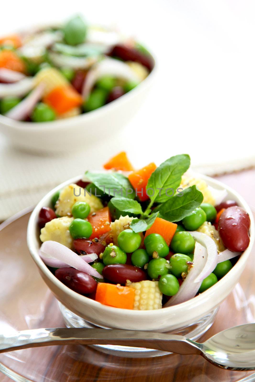 Beans with peas ,baby corn and carrot  salad