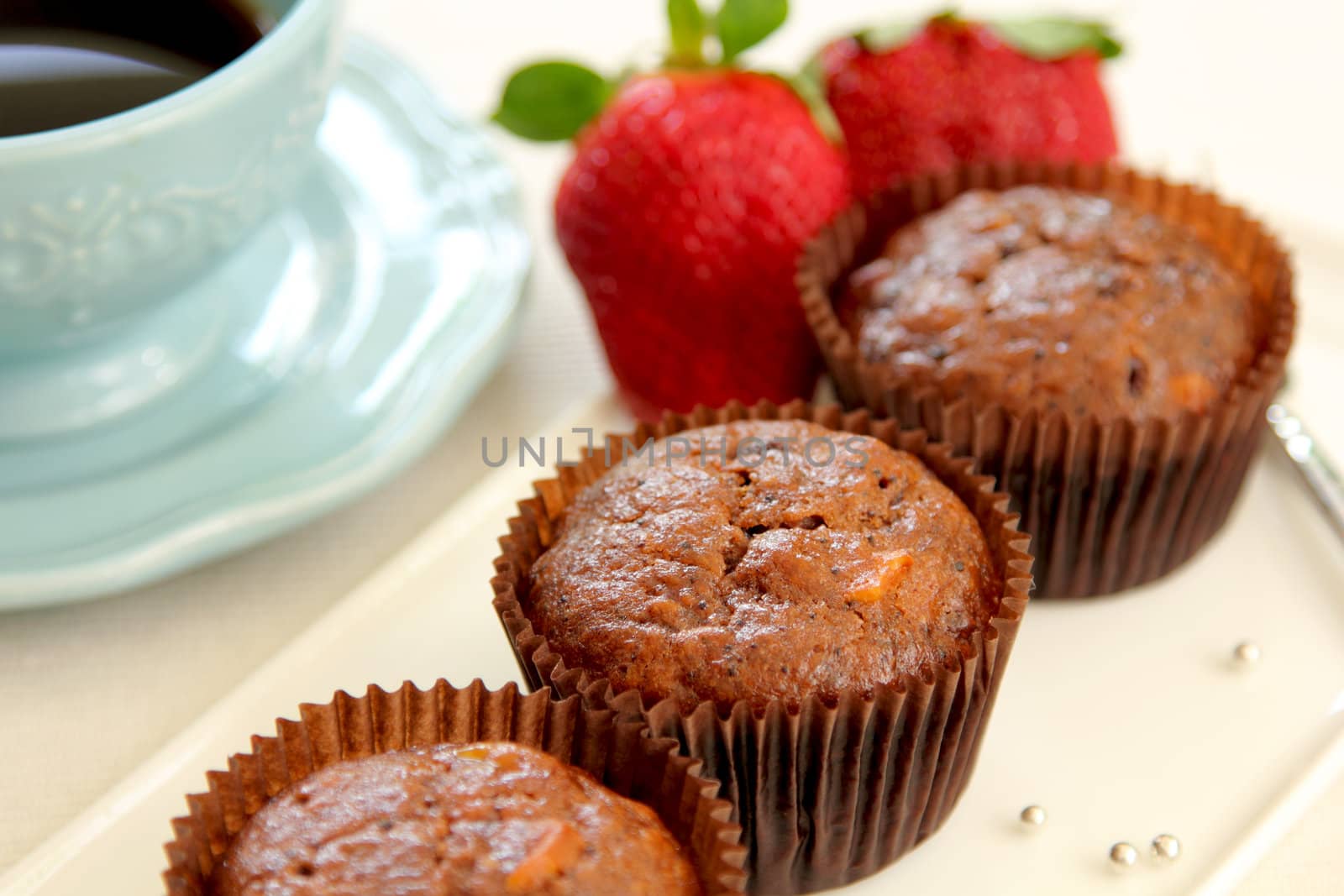 Chocolate cupcake with fresh strawberry