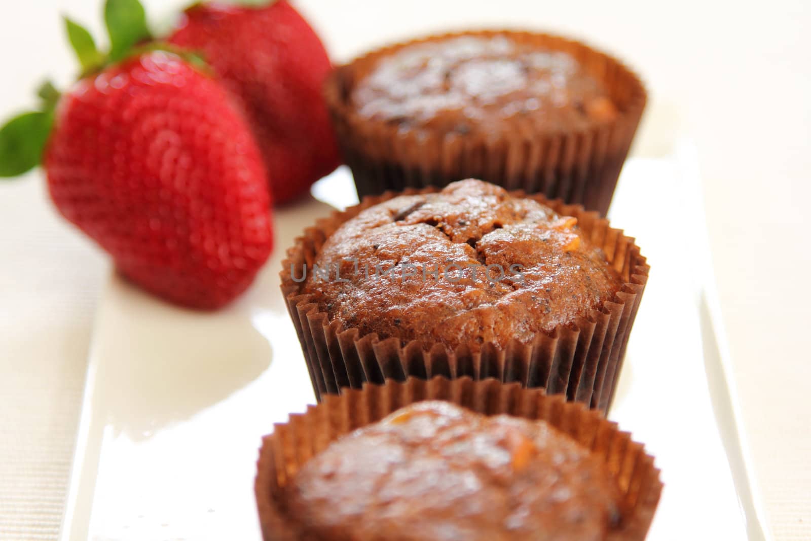 Chocolate cupcake with fresh strawberry