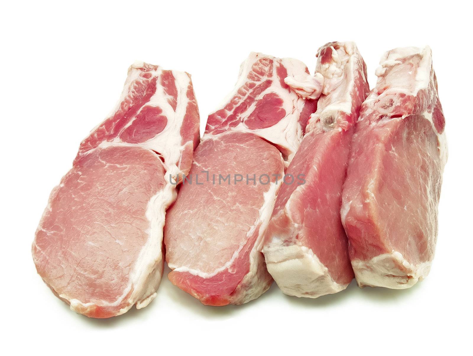 Some pork chops on a white background