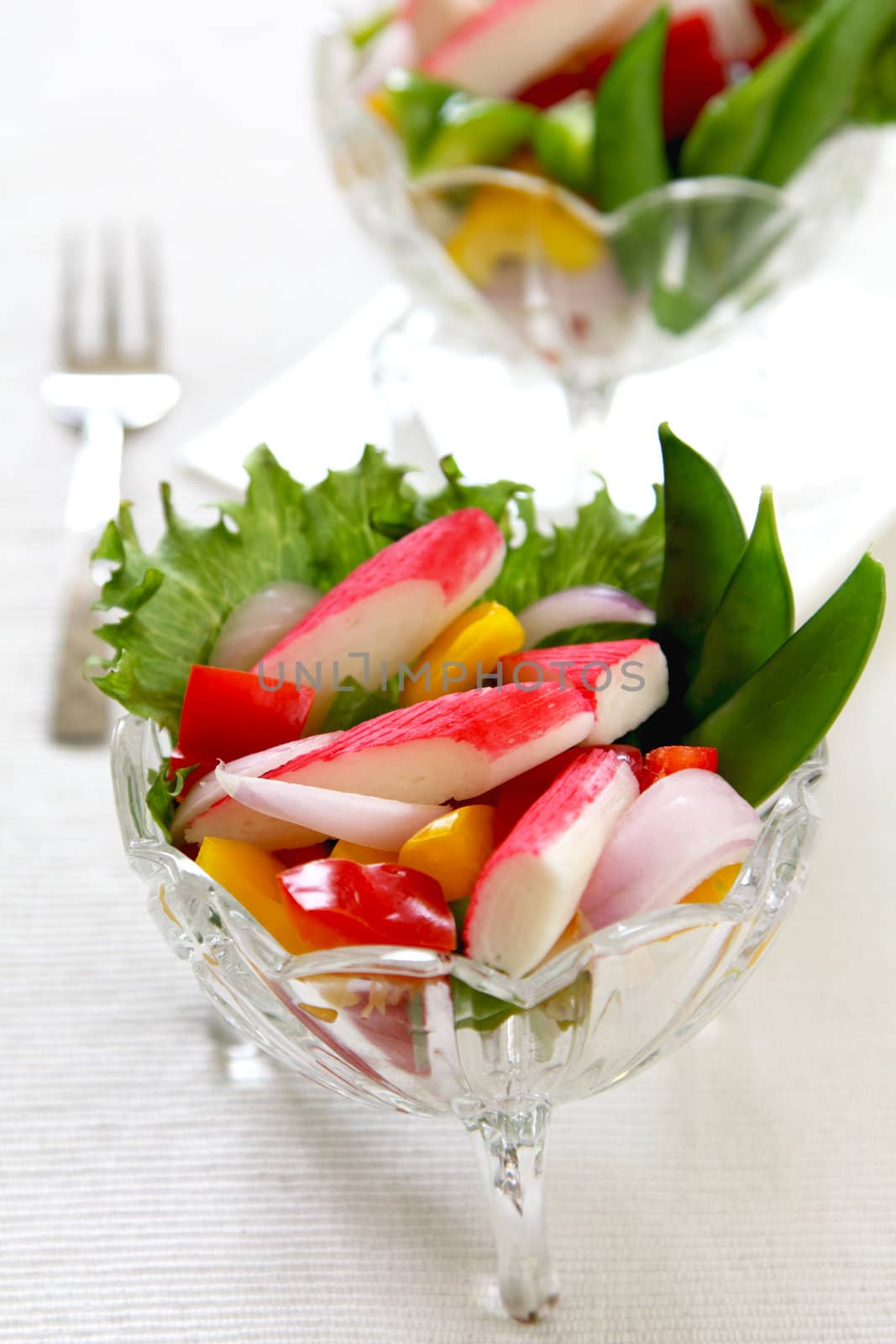 Crab stick with pepper and lettuce salad