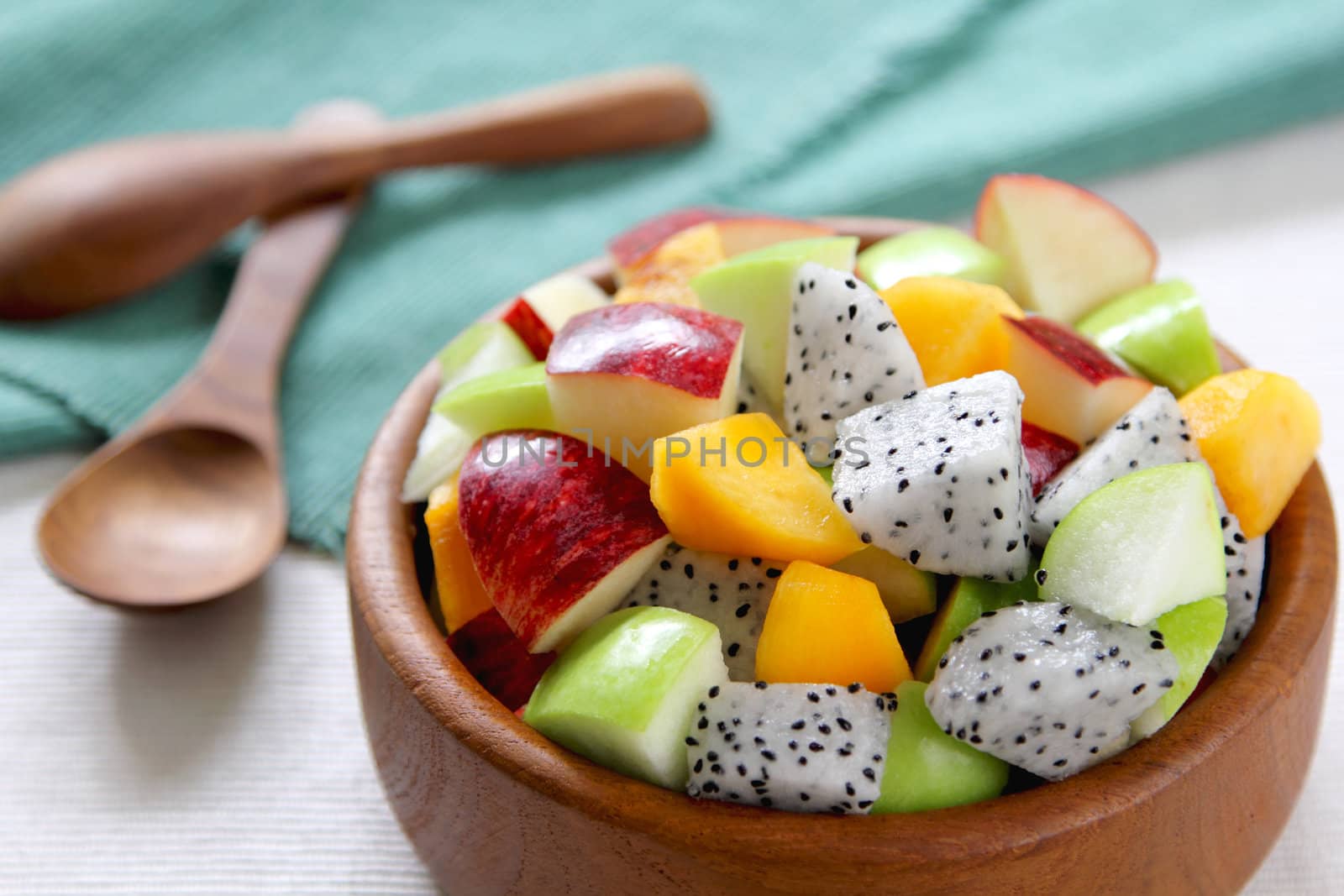 Fruit salad  [ varietie of fruit salad in a wood bowl ]