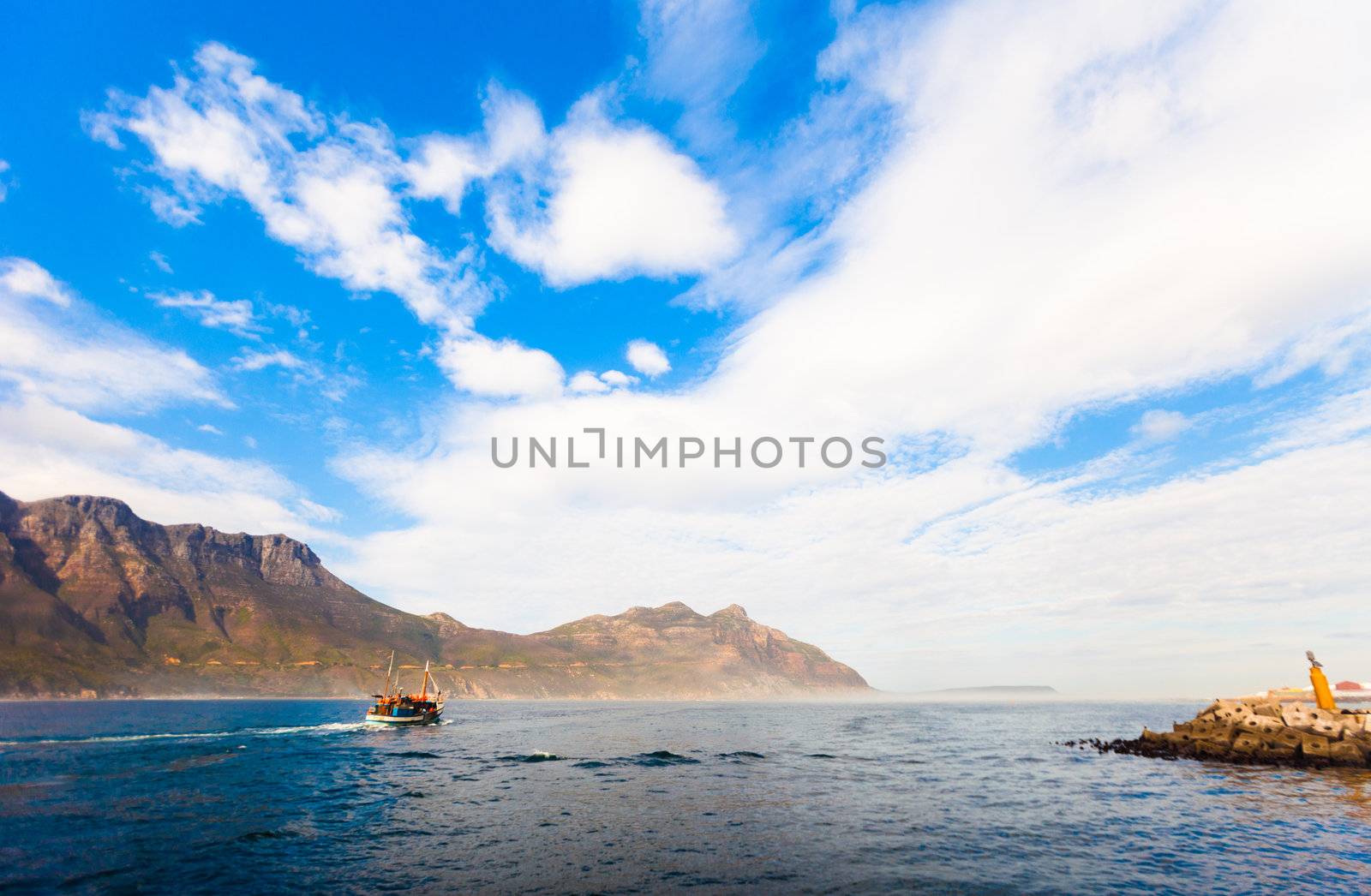 Fishing boat steaming out of Hout Bay