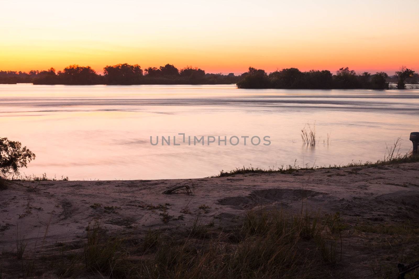 The Zambezi River at dusk, seen from Zambia