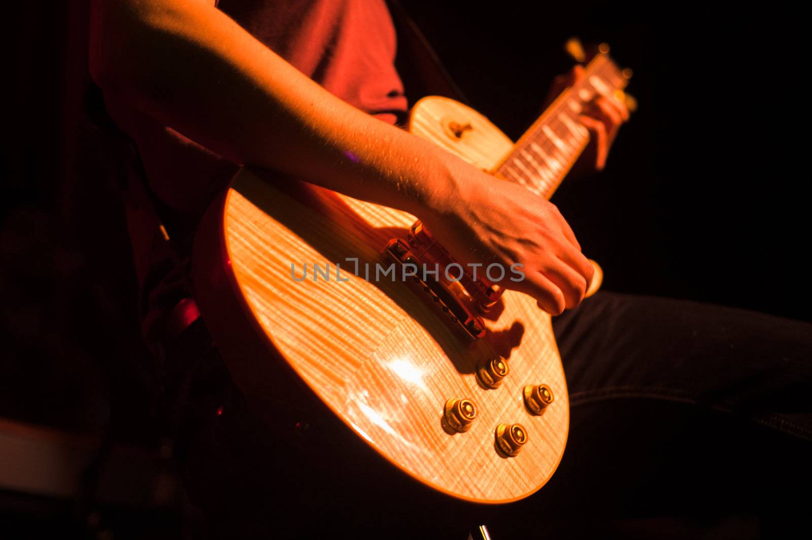 Guitarist on stage by edan