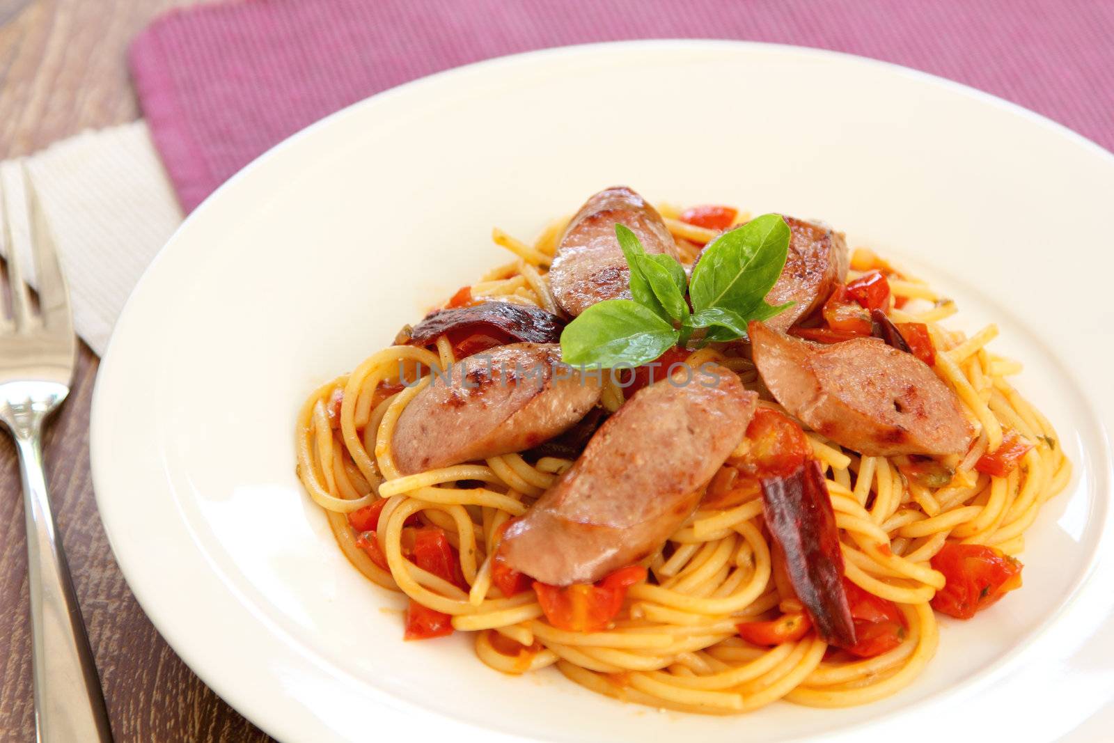 Spaghetti with sausage and tomato by vanillaechoes