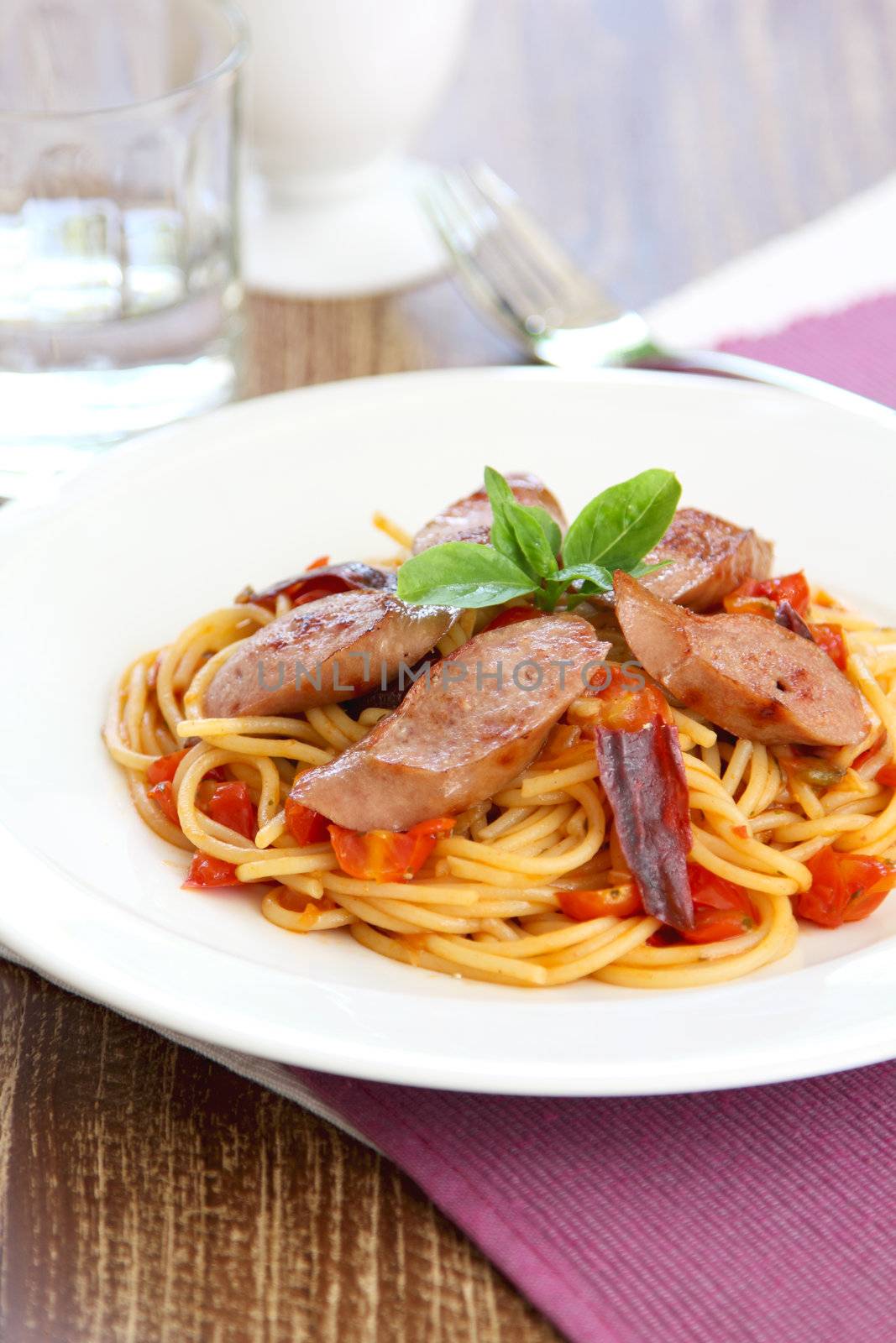 Pasta with sausage ,tomato and dried chilli