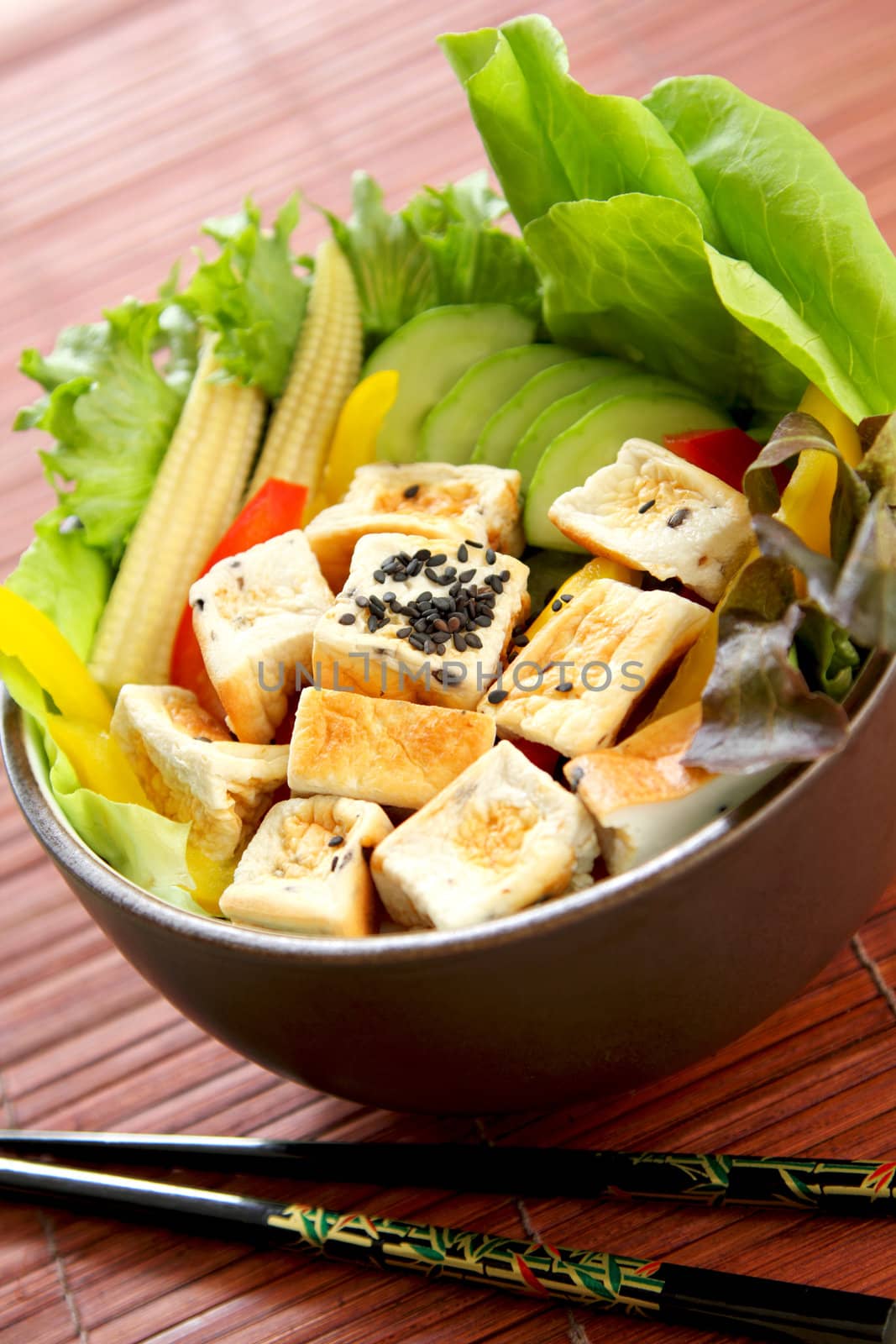Tofu salad with varieties of vegetables and black sesame