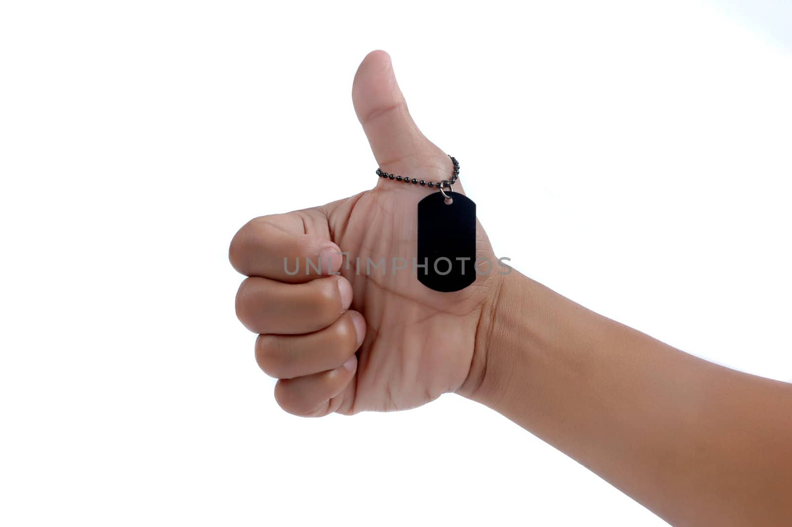 thumbs up and a black metal blank tag isolated on white background