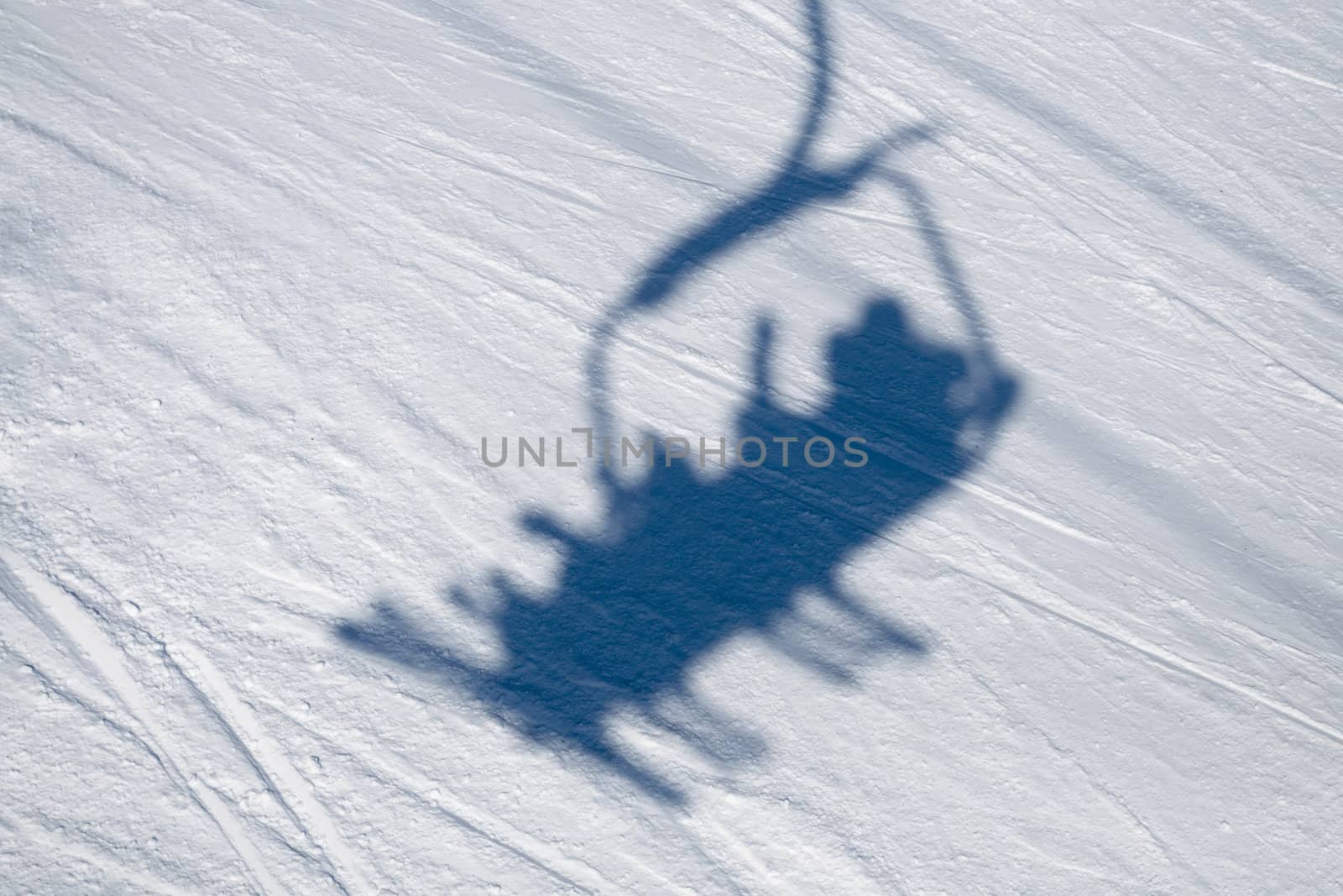 ski lift shadow on the snow