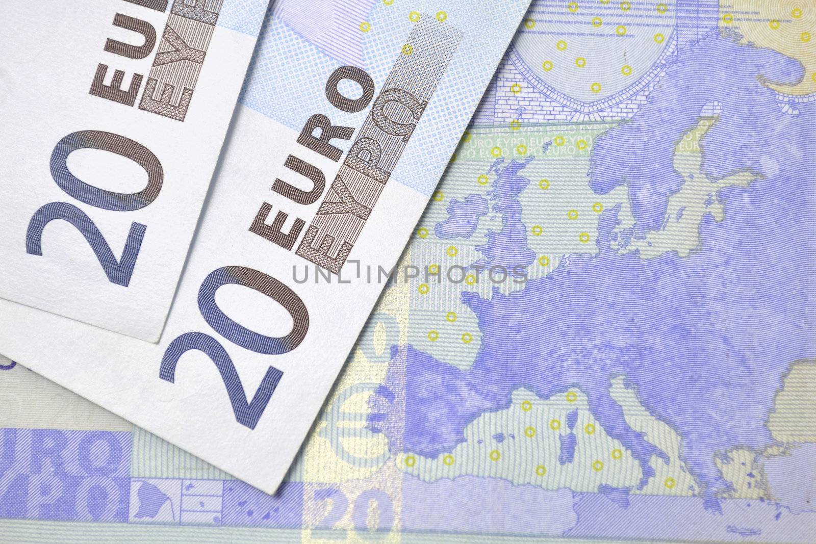 banknotes of 20 Euro on the European map background