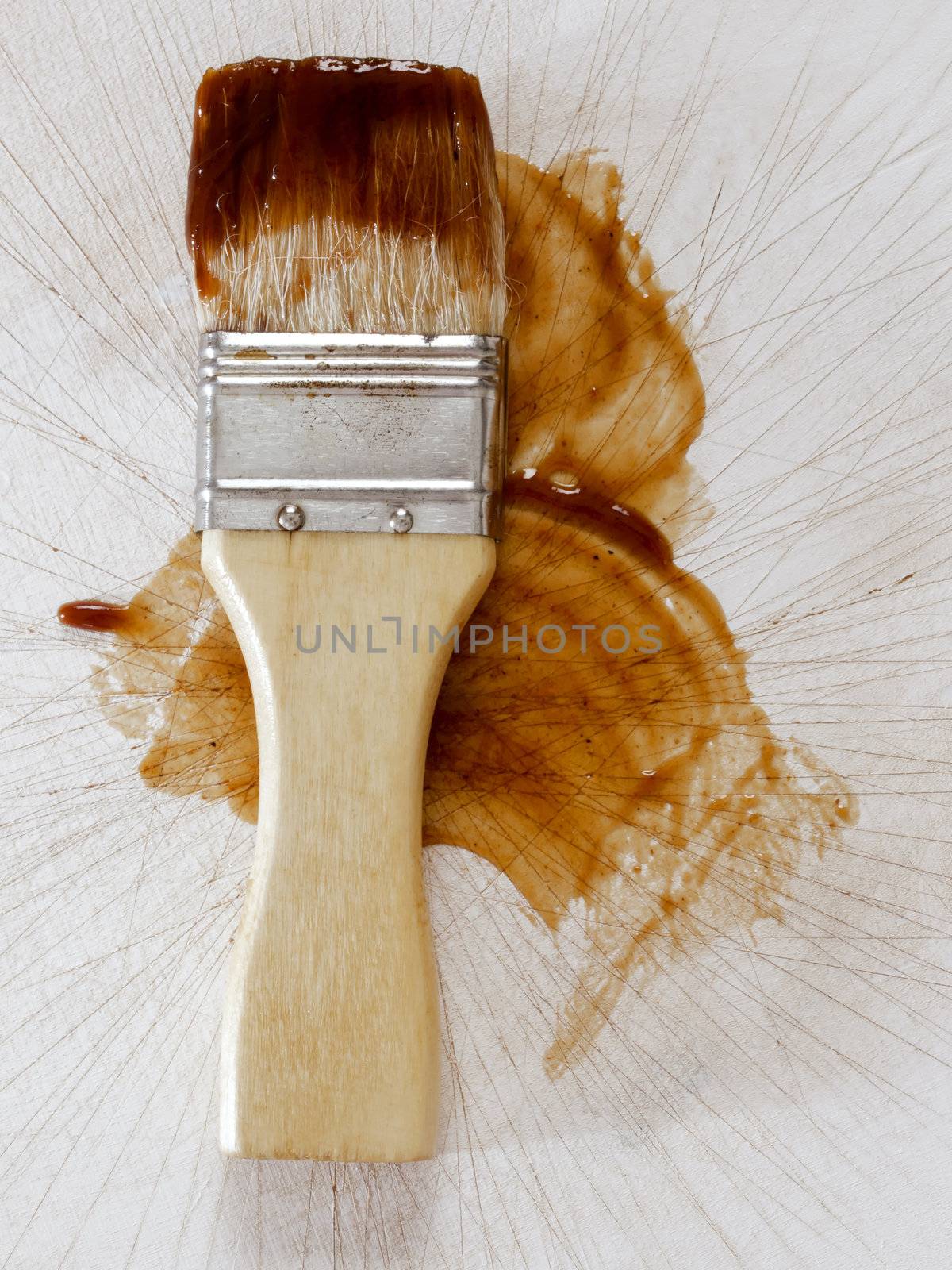 close up of a barbecue sauce basting brush