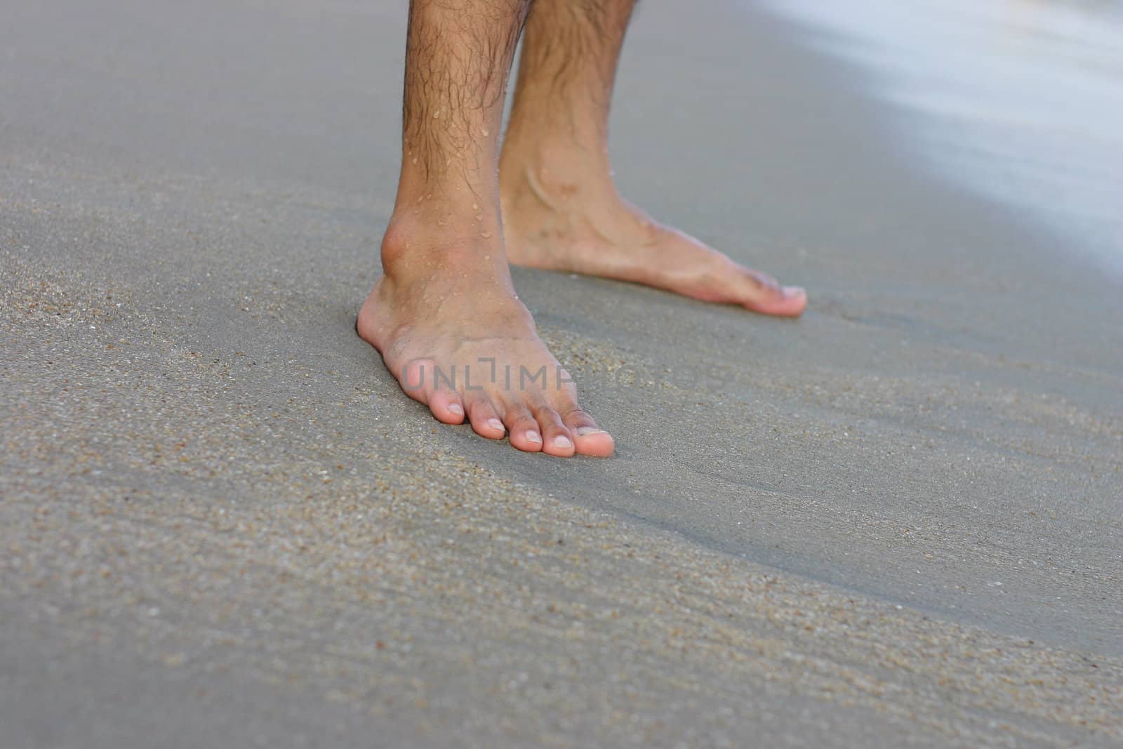 Feet on a Sand