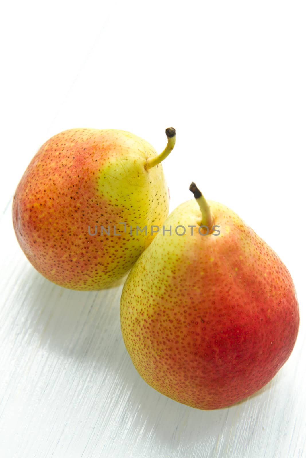 couple of pear on white