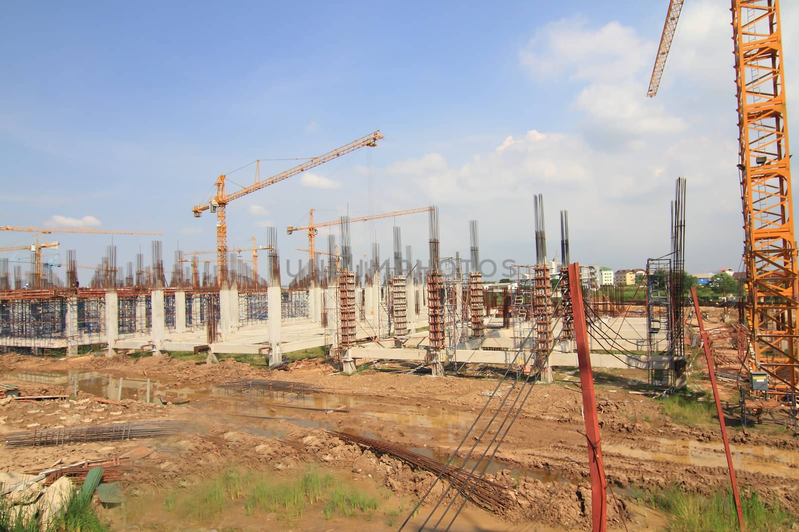 Construction site with enforced concrete steel frames rising up
