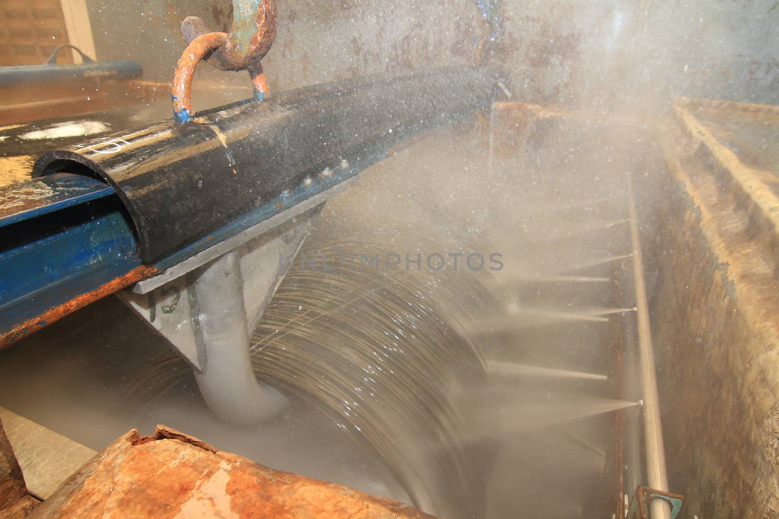 Large spools of Steel Coils being moved.