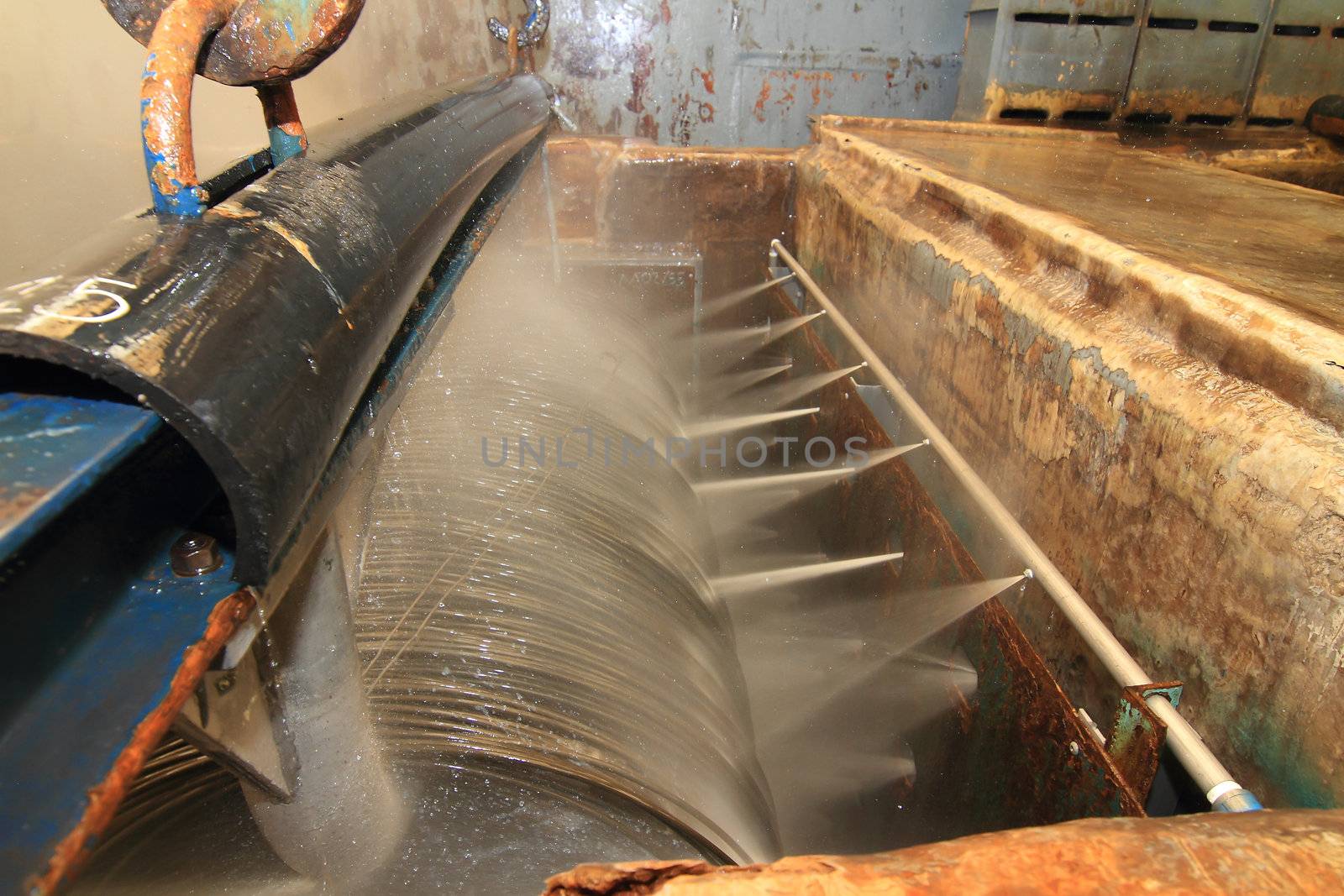 Large spools of Steel Coils being moved.