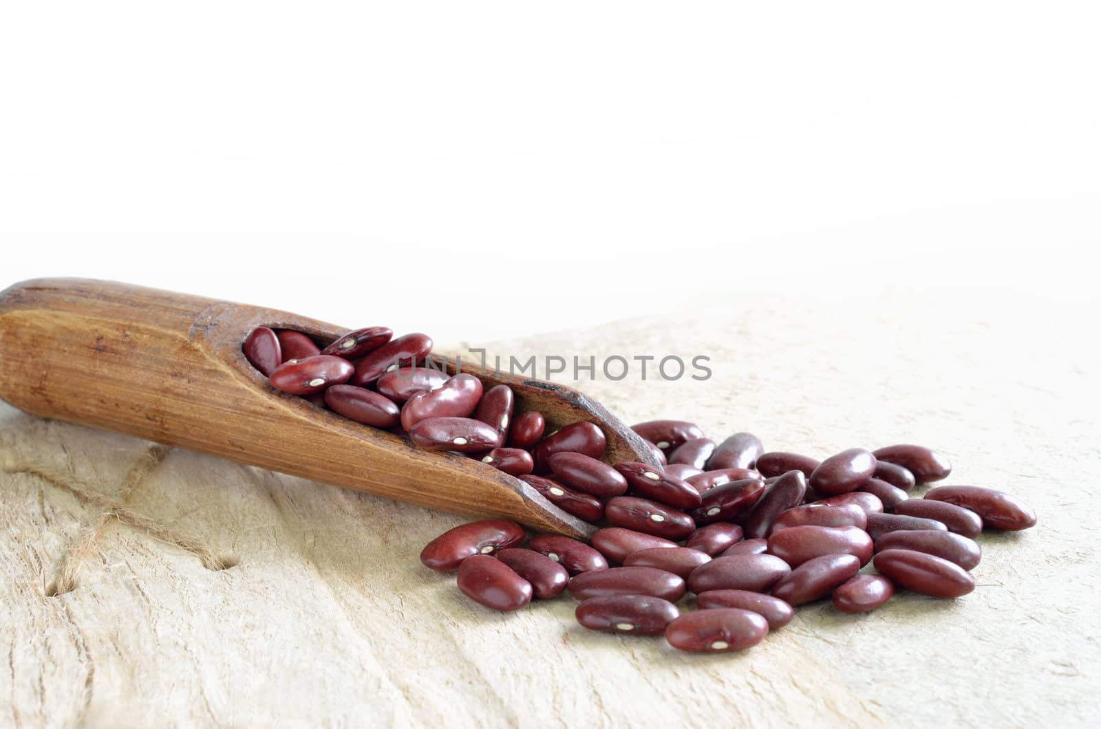 Red beans on wood