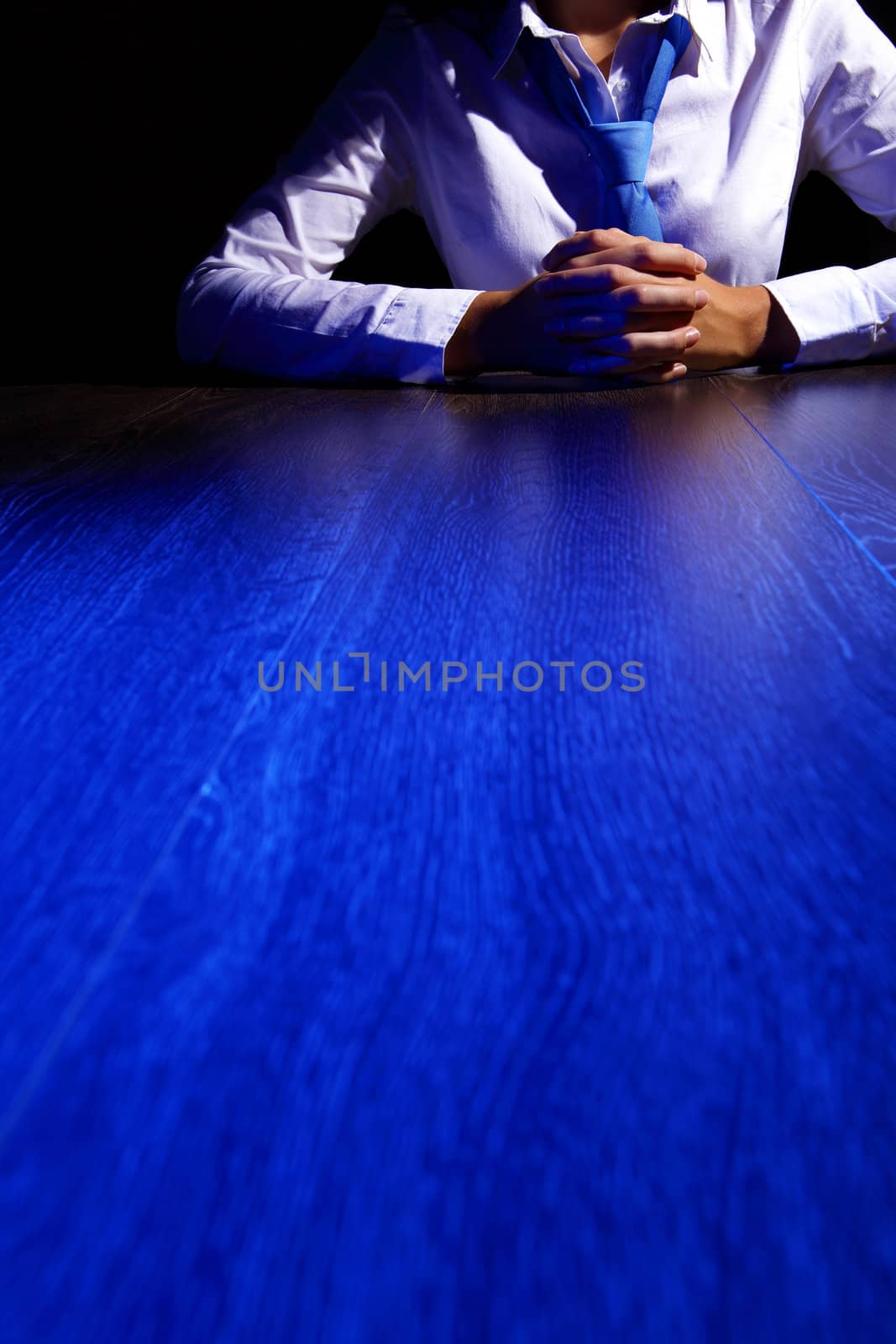 Business woman at office sitting at table