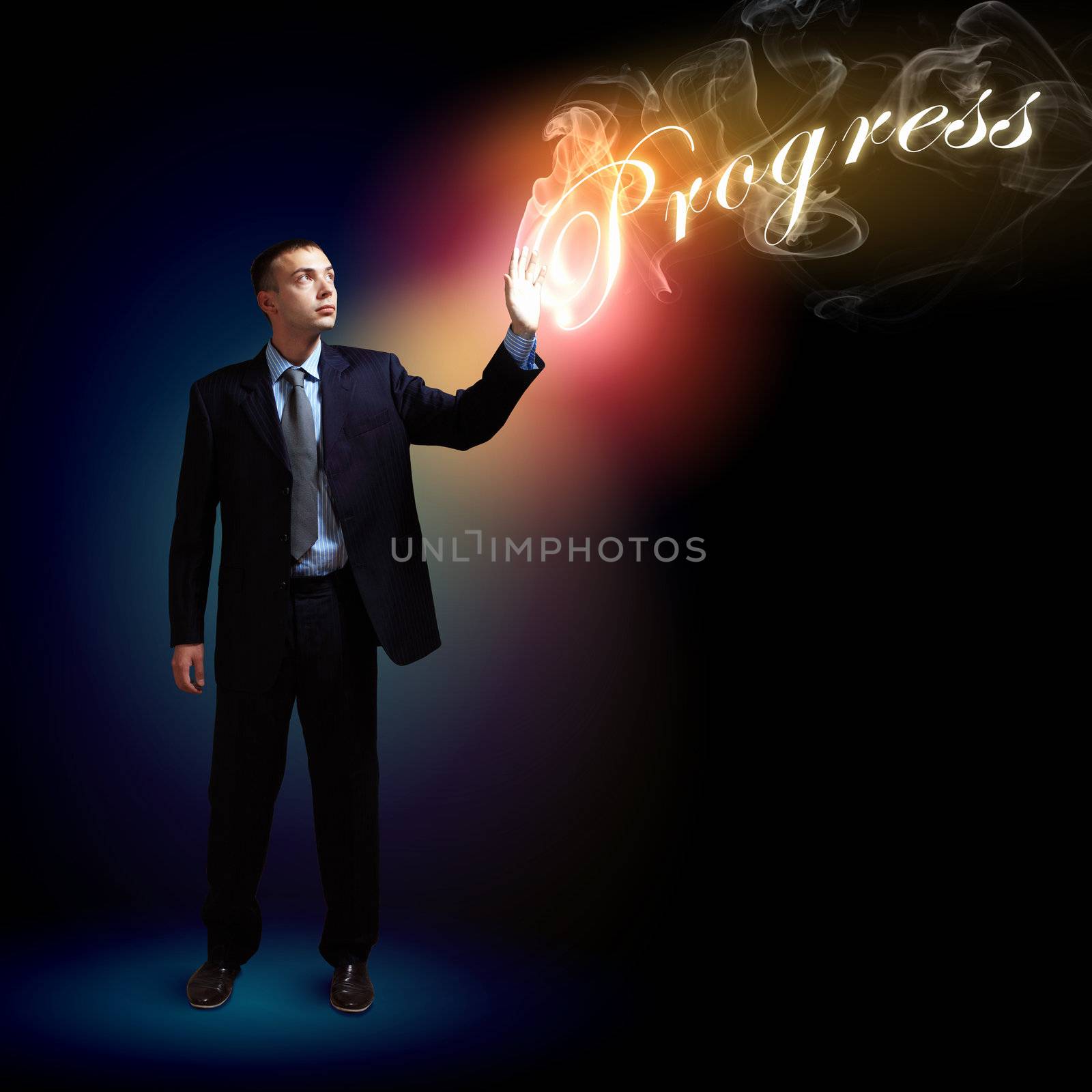Businessman with light shining by sergey_nivens