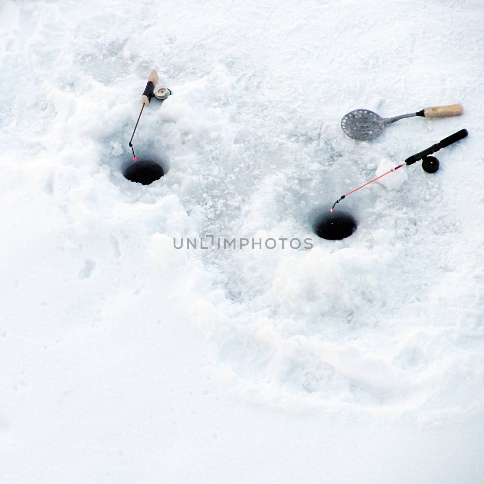 fishing-rod near ice-holes
