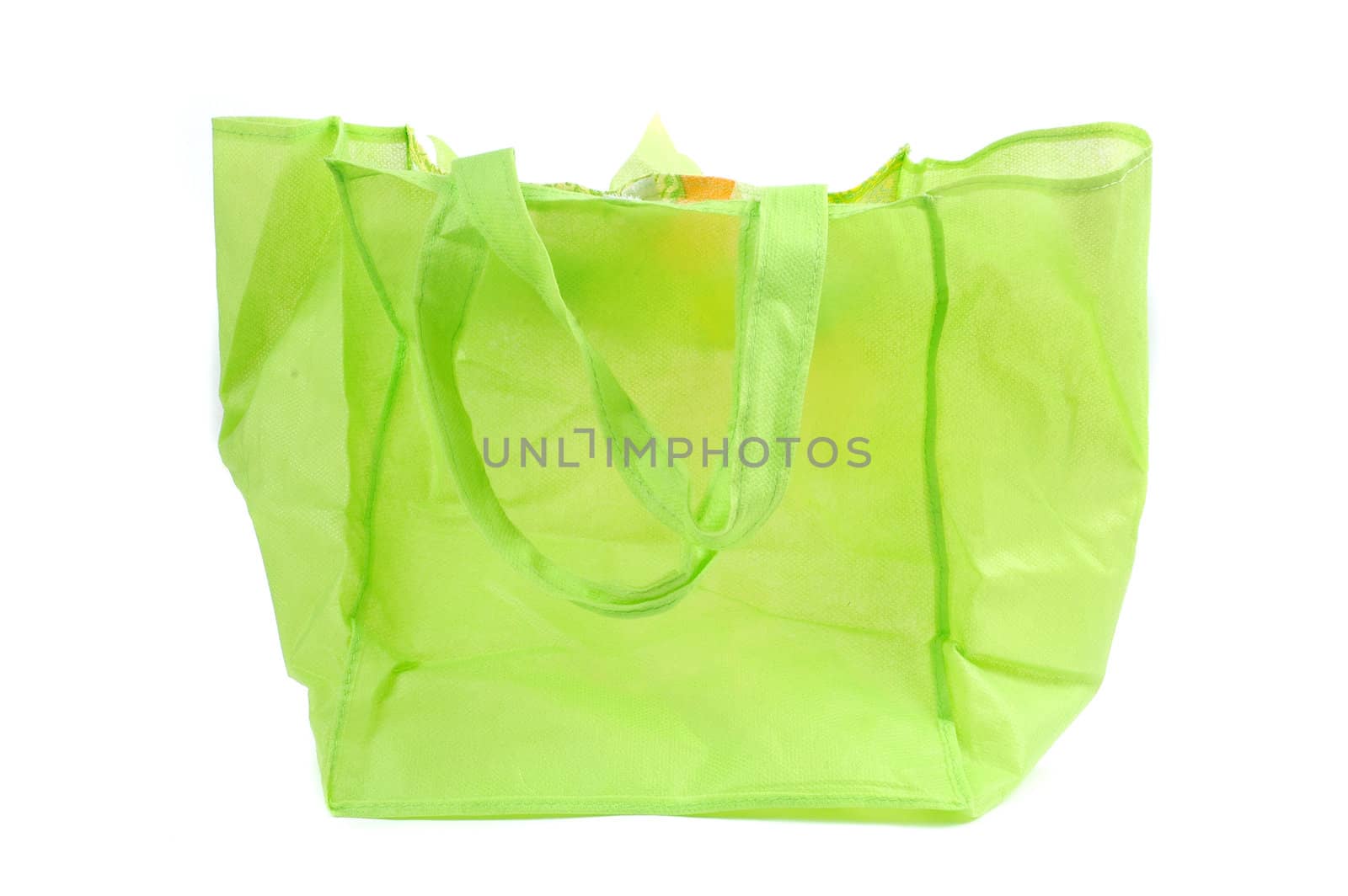 a green cotton bag isolated on white background