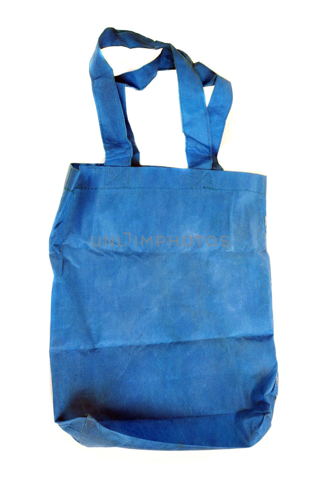 a blue cotton bag isolated on white background