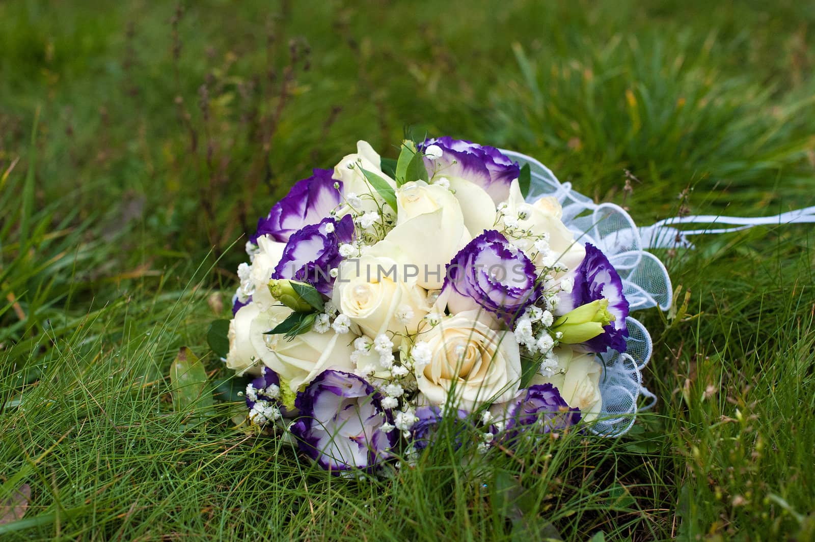 wedding bouquet of blue and white flowers