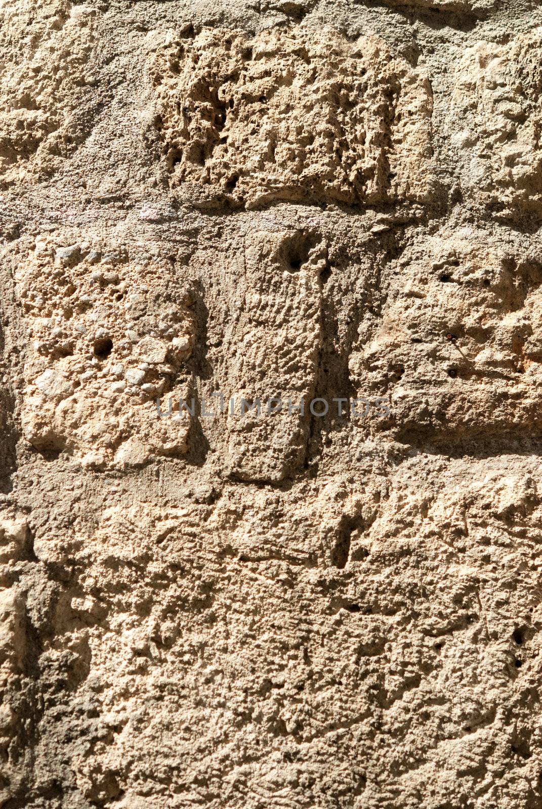 Surface of ancient textured stonework background. Brown tint