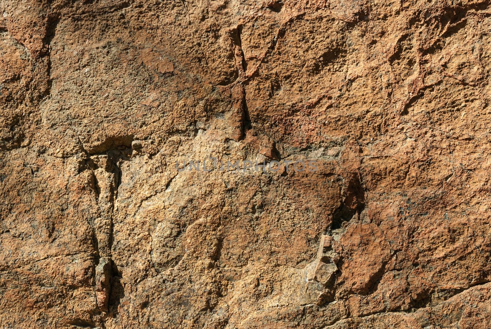 Surface of Textured stone background. Yellow tint