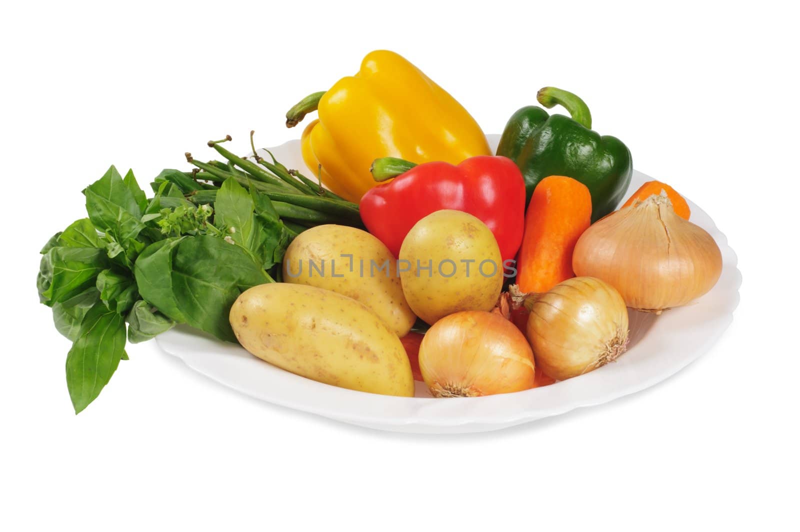 Plate with vegetables for a salad. Bell peppers, potatoes, onions, carrots and herbs. Isolated on white.