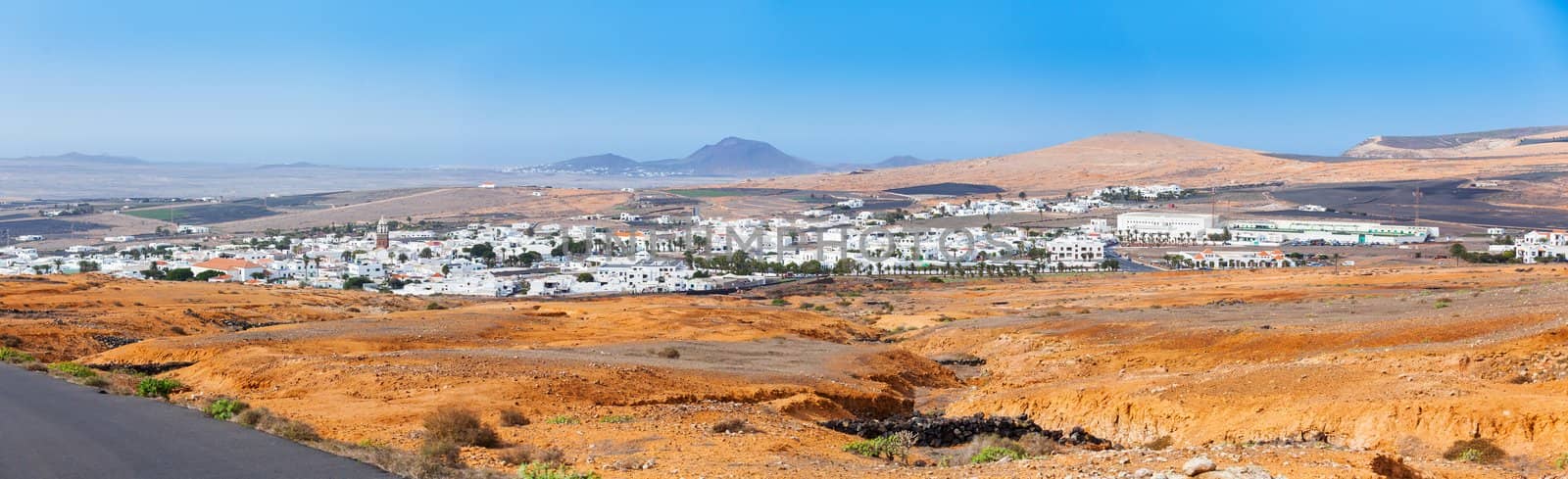 Panorama of a typical cottage town, built on the lava of the volcano. Lanzarote, Canary Islands