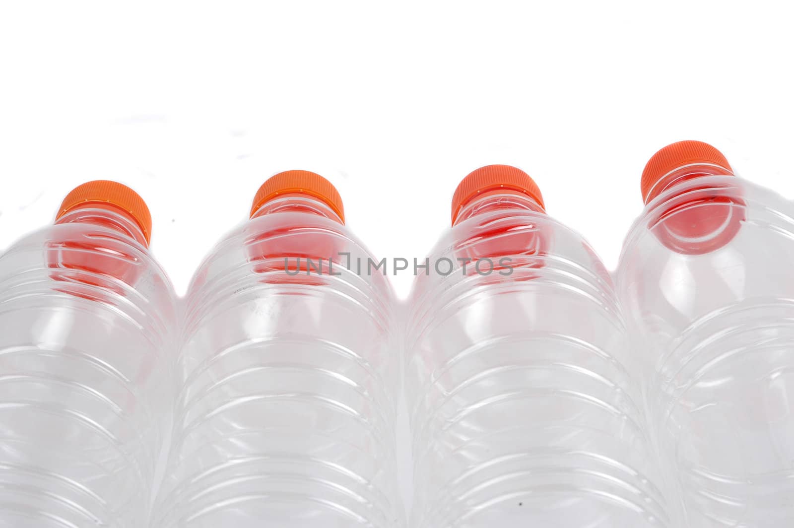 four closed plastic bottles  by antonihalim