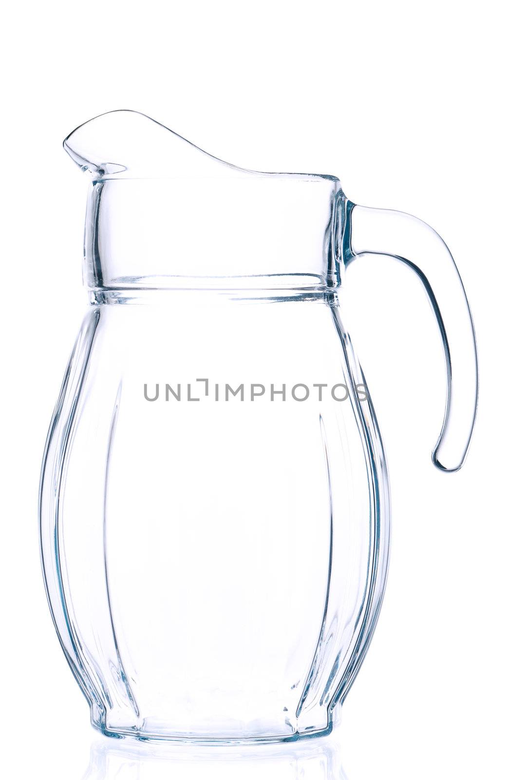 Empty pitcher for juice or milk on white background