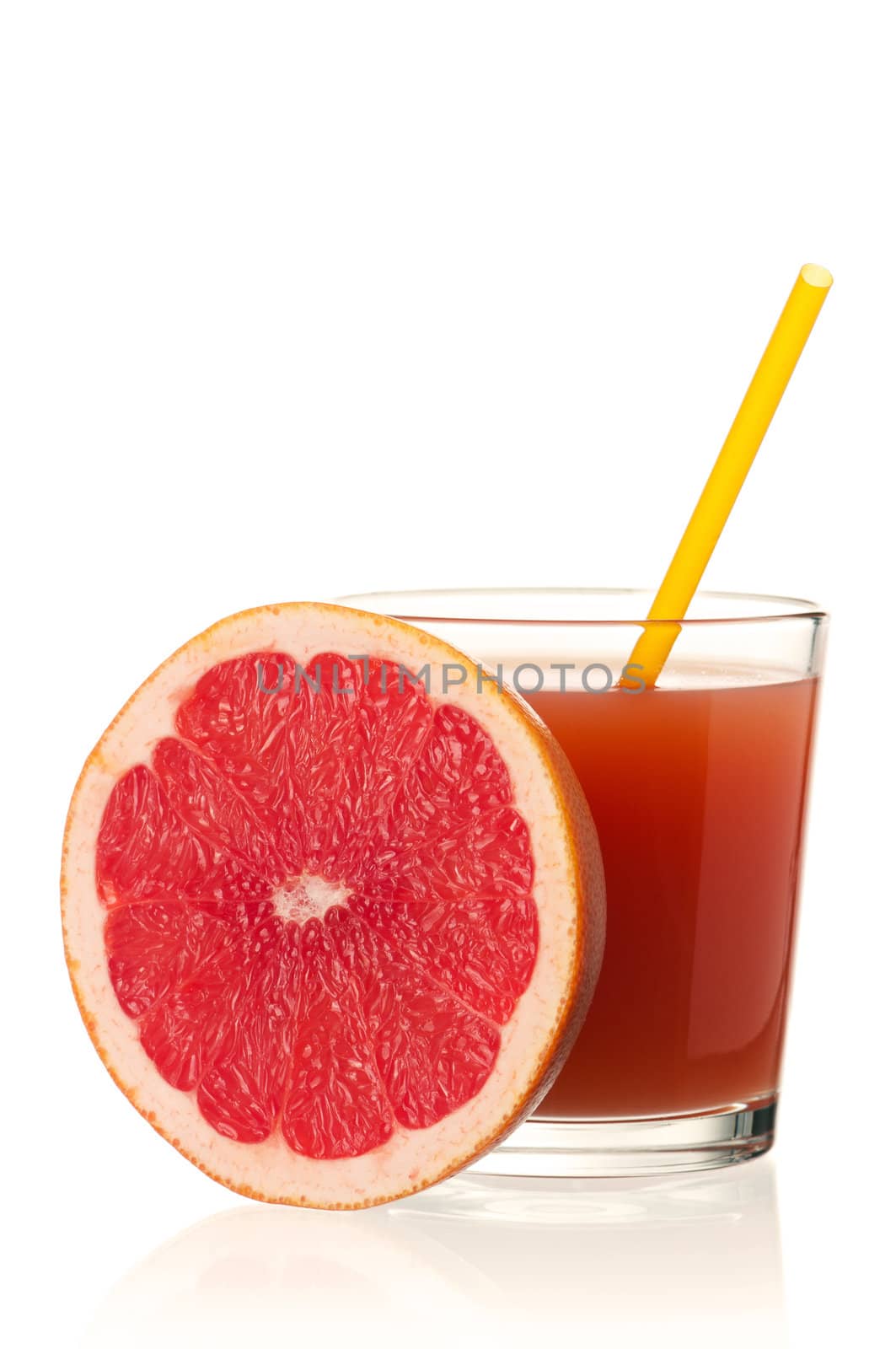 Glass of fresh grapefruit juice and grapefruit fruits on white background