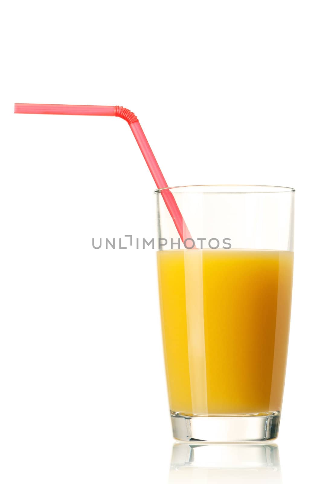 Glass of fresh orange juice with straw on white background